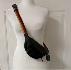 COACH Women’s Crossbody Bag with Multicolor Strap pebbled leather.